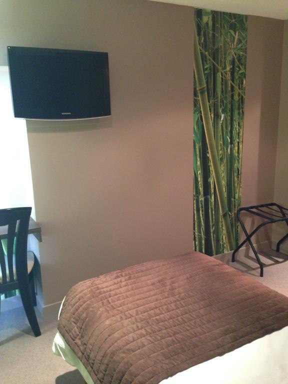 Le Relais Des Bergers Hotell Saint-Martin-en-Haut Rom bilde